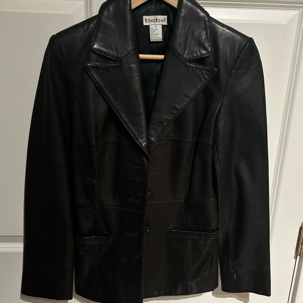 BEBE Black Leather Jacket. Very nice good quality, soft leather. Slim fit.